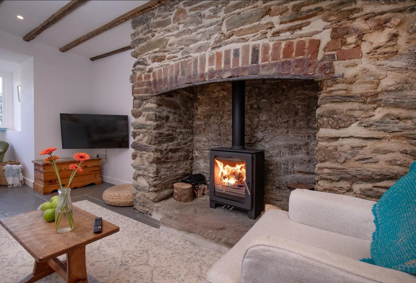 Original stone fireplace and wood burner