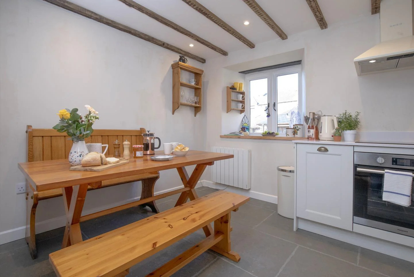Kitchen diner with wooden table and benches